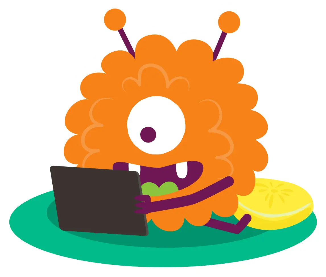Little monster playing learning games on tablet