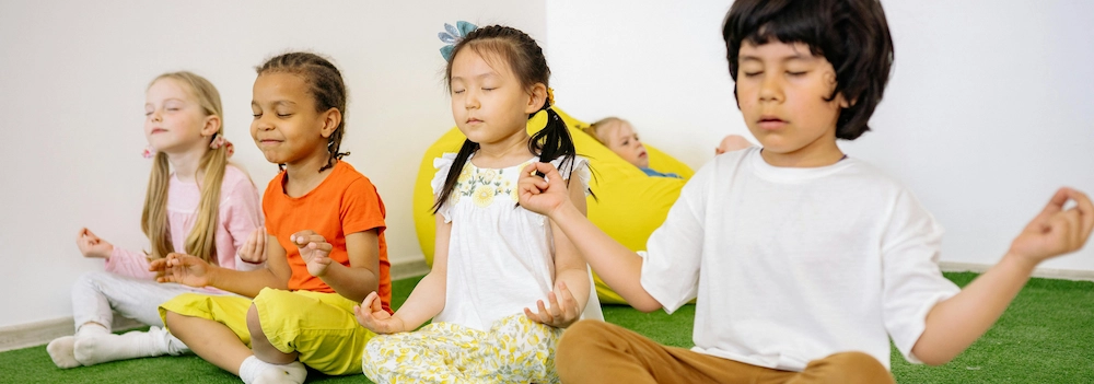 Kids practising yoga