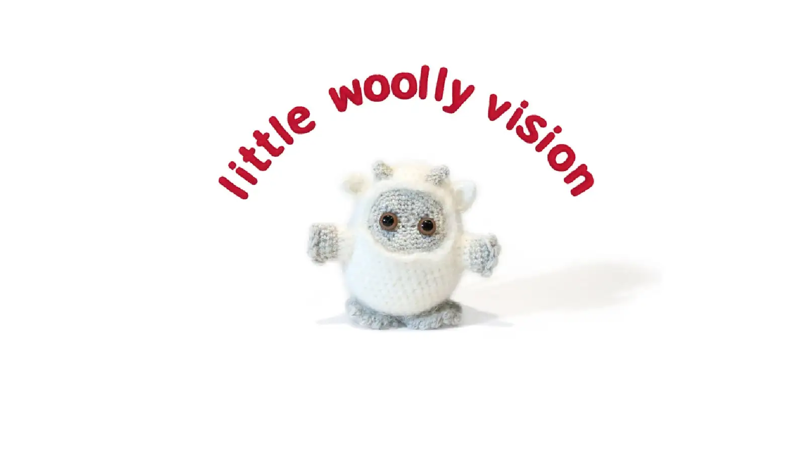 Crochet yeti on white background with “little woolly vision” text—ideal minimal stimulation nursery rhymes	